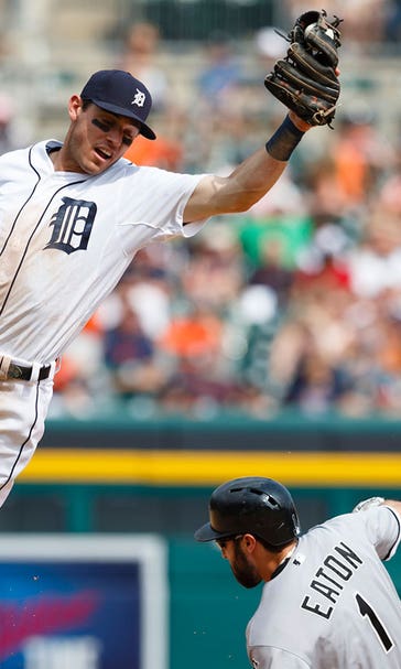 Tigers get bonus in Kinsler's defense